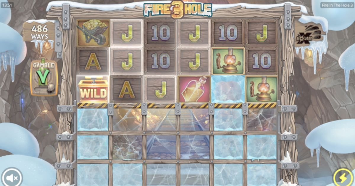 Fire in the Hole 3 slot review — base game showing the 6-reel grid with ice-buried symbols and xBomb wilds